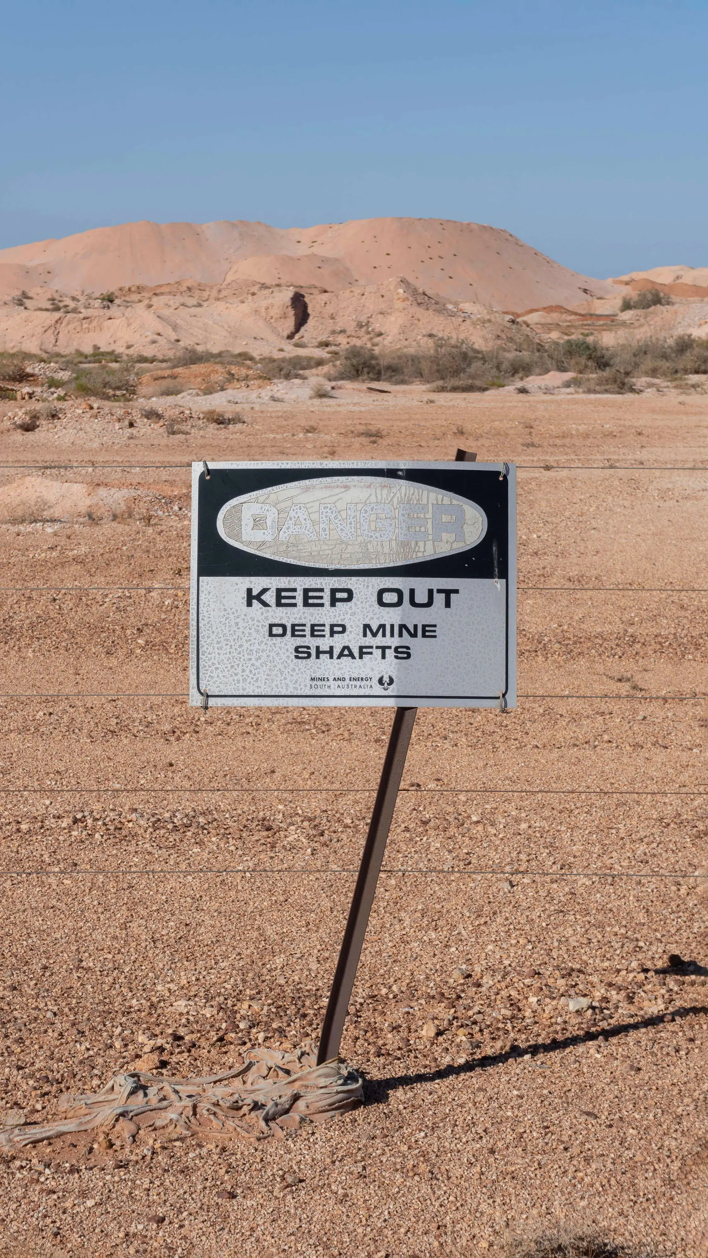 danger sign: keep out, deep mine shafts